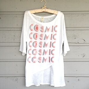 FREE PEOPLE COSMIC TEE “WE THE FREE” SLANT FRONT TO SIDE SEAM COSMIC LOOK!